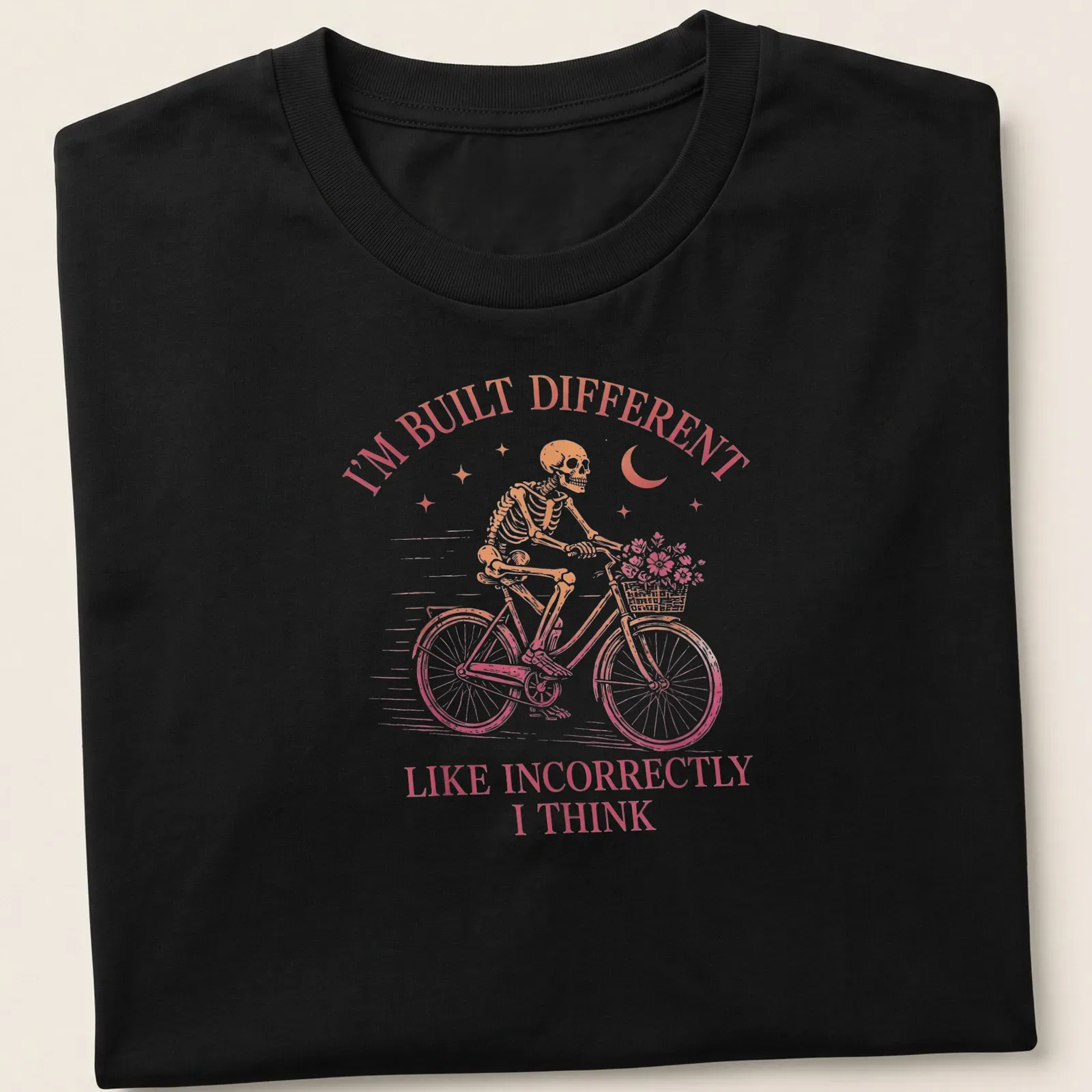Vintage skeleton riding a bicycle with humorous text in pink and brown — printed on a unisex t-shirt