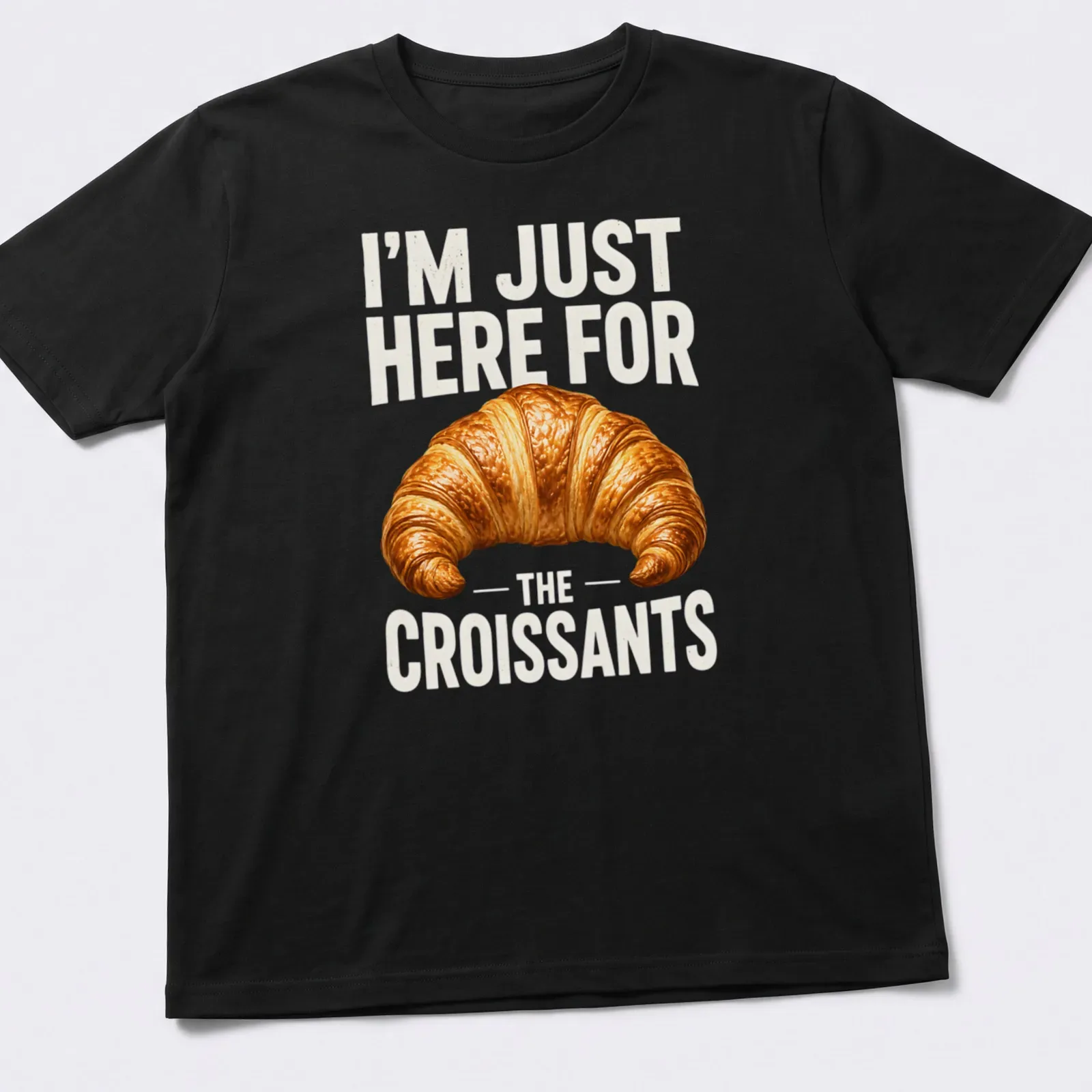 Realistic illustration of a golden brown croissant with text about croissants — printed on a unisex t-shirt