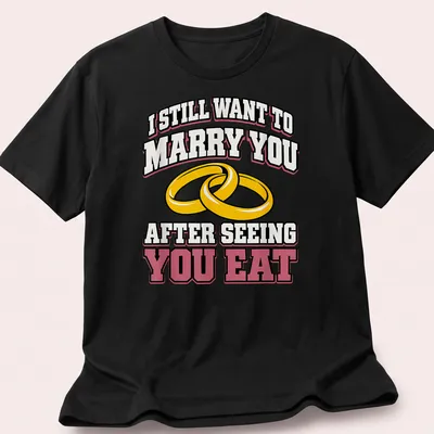 Bold text and wedding rings on a playful t-shirt about love and food