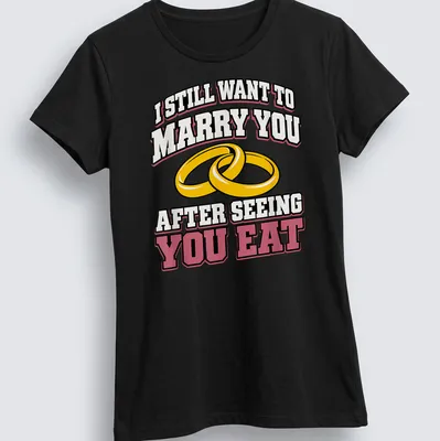 Bold text and wedding rings on a playful t-shirt about love and food — printed on a women's shirt