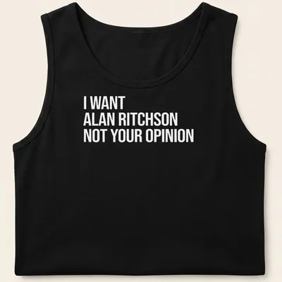 Bold text on a black and white tee expressing a humorous preference for Alan Ritchson. — printed on a tank top