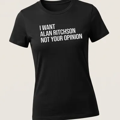 Bold text on a black and white tee expressing a humorous preference for Alan Ritchson. — printed on a women's shirt