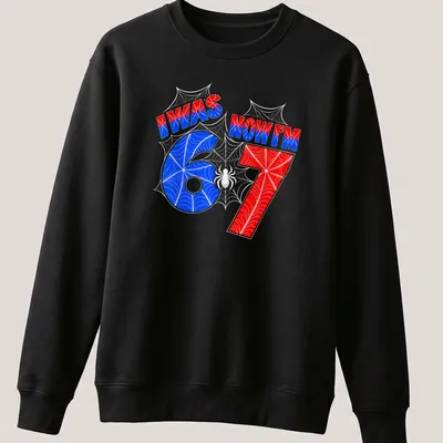 Colorful birthday shirt with spider web design and text for turning 7 — printed on a unisex sweatshirt