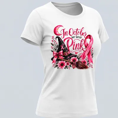 Vintage floral design of a pink witch hat and broom with the text In October we wear Pink — printed on a women's shirt