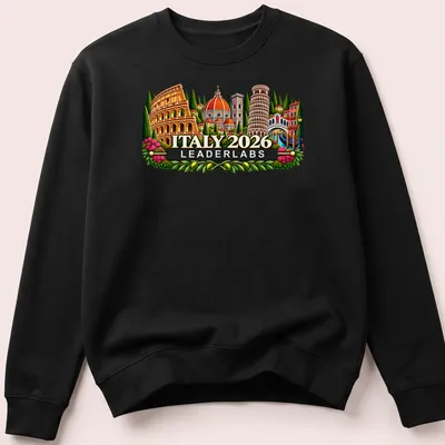 Vibrant illustration of famous Italian landmarks with text Italy 2026 Leaderlabs — printed on a unisex sweatshirt