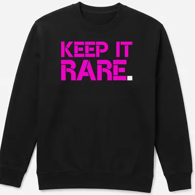 Boldly printed KEEP IT RARE text on a vibrant pink — printed on a unisex sweatshirt