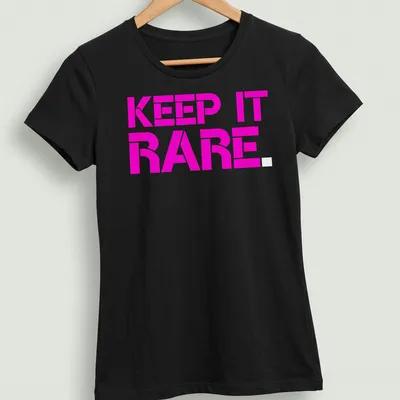 Boldly printed KEEP IT RARE text on a vibrant pink — printed on a women's shirt