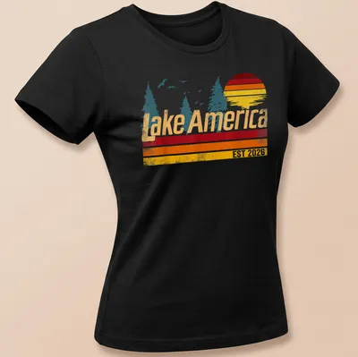 Vintage sunset design with trees and 'Lake America EST 2026' text — printed on a women's shirt