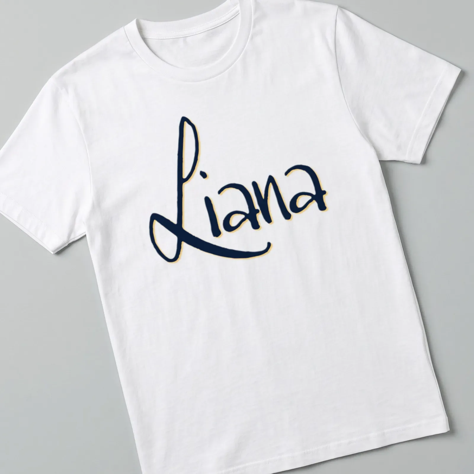 Personalized T-shirt featuring the name Liana in modern script style — printed on a unisex t-shirt