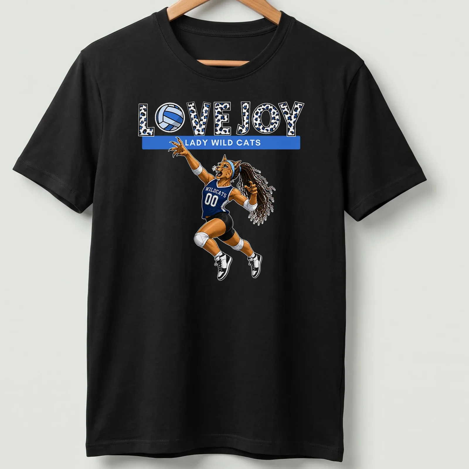 Illustrative T-shirt featuring a wildcat playing volleyball with team name above — printed on a unisex t-shirt