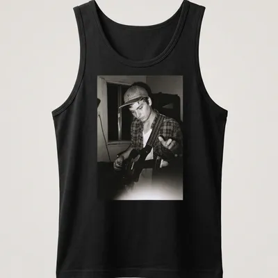 Vintage black and white photo of musician Mac DeMarco playing guitar — printed on a tank top