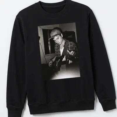 Vintage black and white photo of musician Mac DeMarco playing guitar — printed on a unisex sweatshirt