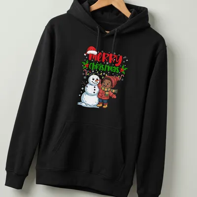 Kawaii cartoon of a boy building a snowman with Merry Christmas text — printed on a unisex hoodie