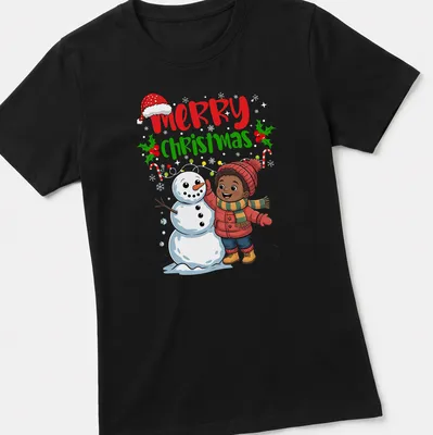 Kawaii cartoon of a boy building a snowman with Merry Christmas text — printed on a women's shirt