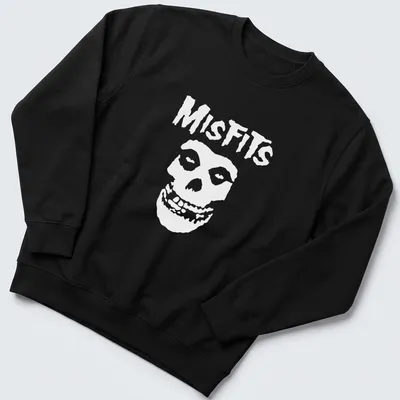 Bold graphic of a skull with the word Misfits in black and white. — printed on a unisex sweatshirt
