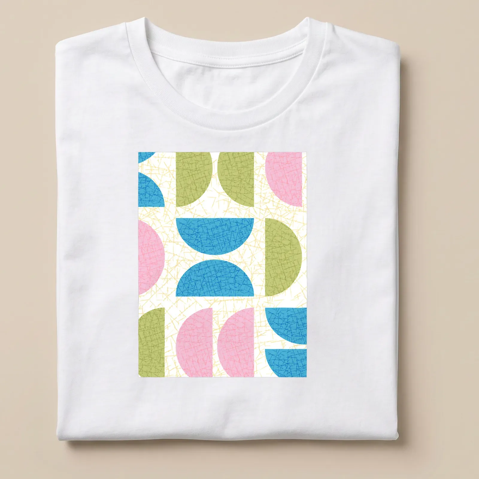 T-shirt featuring a textured pattern of semicircle shapes in various colors. — printed on a unisex t-shirt