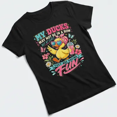 Colorful cartoon T-shirt featuring a happy yellow duck and playful text — printed on a women's shirt