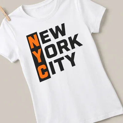 Bold block lettering NYC New York City T-shirt in black and orange — printed on a women's shirt