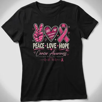 Colorful hand-drawn Cancer Awareness tee with peace sign, heart, and pink ribbon — printed on a women's shirt