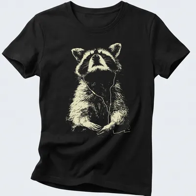 Sketch of a peaceful raccoon wearing earbuds, listening to music in light beige and white — printed on a women's shirt
