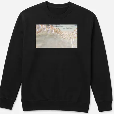 Illustration of a pearl necklace resembling a waterfall in soft colors. — printed on a unisex sweatshirt