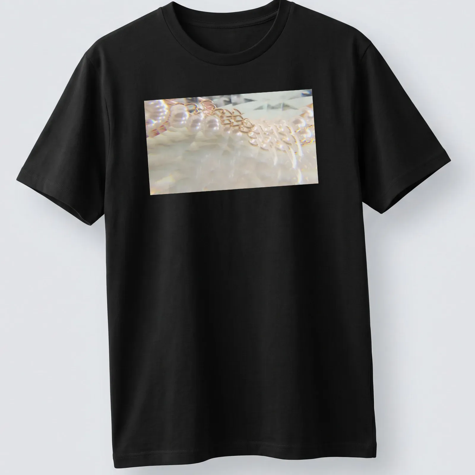 Illustration of a pearl necklace resembling a waterfall in soft colors. — printed on a unisex t-shirt