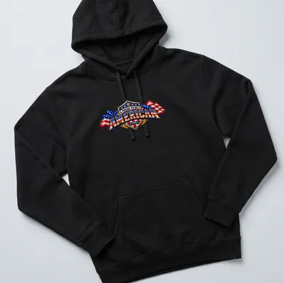Vintage patriotic T-shirt with American flags and proud text in shield — printed on a unisex hoodie