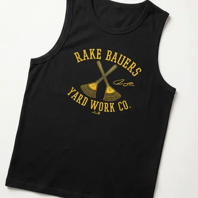 Bold vintage graphic tee with crossed rakes and yard work company text — printed on a tank top