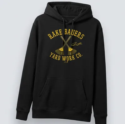 Bold vintage graphic tee with crossed rakes and yard work company text — printed on a unisex hoodie