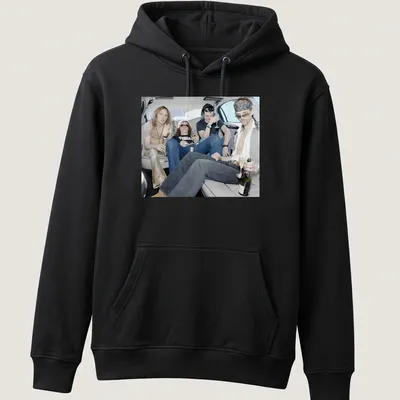 Photographic print of rock band members celebrating in a limousine, with vibrant colors — printed on a unisex hoodie
