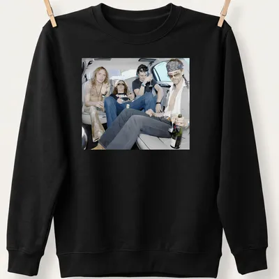 Photographic print of rock band members celebrating in a limousine, with vibrant colors — printed on a unisex sweatshirt