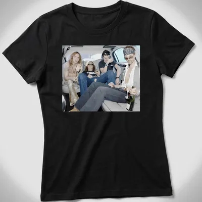 Photographic print of rock band members celebrating in a limousine, with vibrant colors — printed on a women's shirt