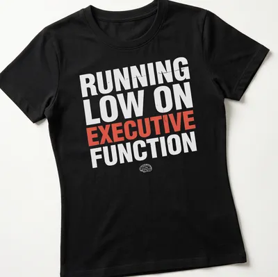 Bold text that says Running Low On Executive Function over a red and white color scheme — printed on a women's shirt