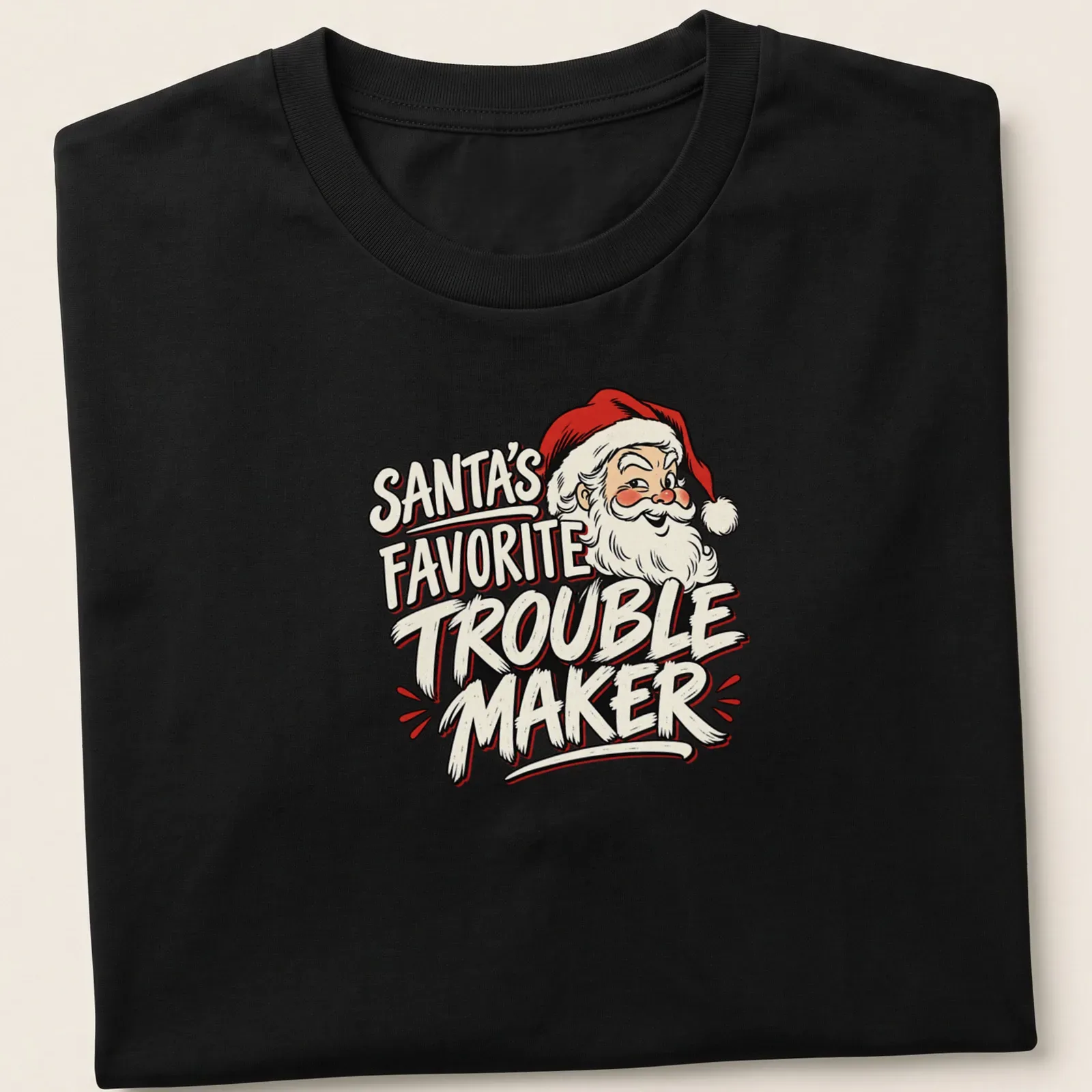 Vintage cartoon Santa Claus with the text 'Santa's Favorite Trouble Maker' in red and cream — printed on a unisex t-shirt