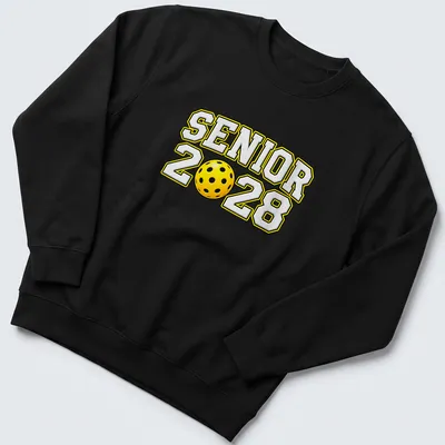 Bold text Senior 2028 with a pickleball graphic in yellow, black, and white — printed on a unisex sweatshirt