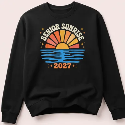 Colorful retro design of a sunrise over water with Senior Sunrise 2027 text — printed on a unisex sweatshirt