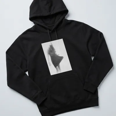 Soft focus monochrome T-shirt featuring a female figure in motion and expressive text — printed on a unisex hoodie