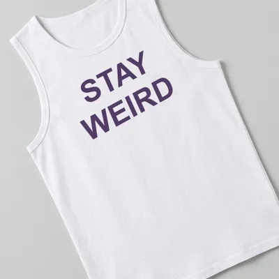 Purple t-shirt with the quote 'Stay Weird' in a playful font — printed on a tank top