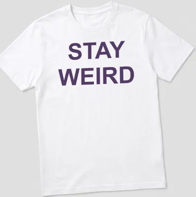 Purple t-shirt with the quote 'Stay Weird' in a playful font