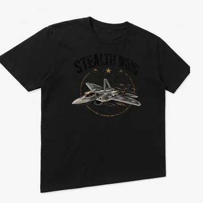 Vintage distressed F-22 fighter jet graphic with 'Stealth Wing' text — printed on a unisex t-shirt (angled view)