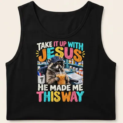 Colorful cartoon raccoon with humorous text, playful design — printed on a tank top