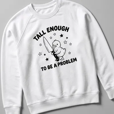 Cartoon duck graphic with humorous text about height in black and white — printed on a unisex sweatshirt