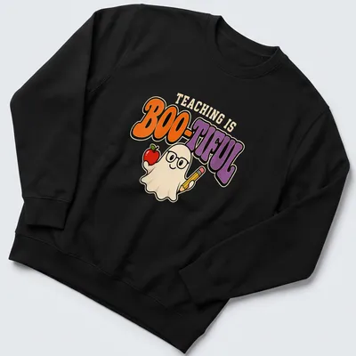 Kawaii ghost holding an apple and pencil with the text 'Teaching Is Boo-Tiful' in colorful design. — printed on a unisex sweatshirt
