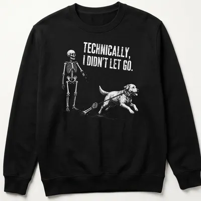 Vintage sketch of a skeleton and a dog with humorous text about letting go — printed on a unisex sweatshirt