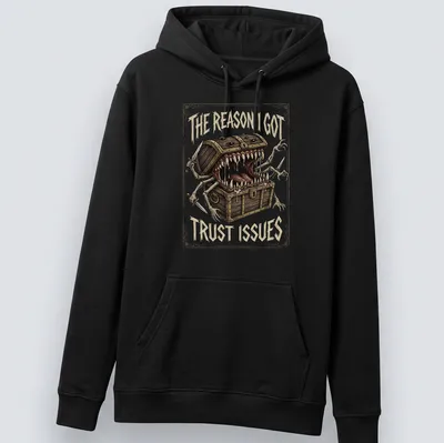 Illustration of a mimic monster with the quote "The Reason I Got Trust Issues" in detailed colors — printed on a unisex hoodie