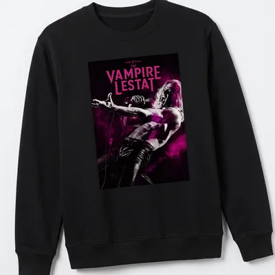 Gothic Vampire Lestat shirt with bold lettering and vampire imagery in black, pink, and white. — printed on a unisex sweatshirt