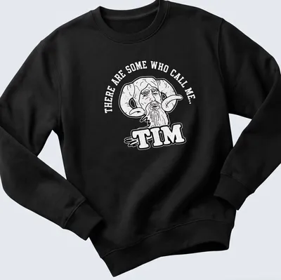 Bold cartoon of a bearded man with ram horns and humorous text — printed on a unisex sweatshirt