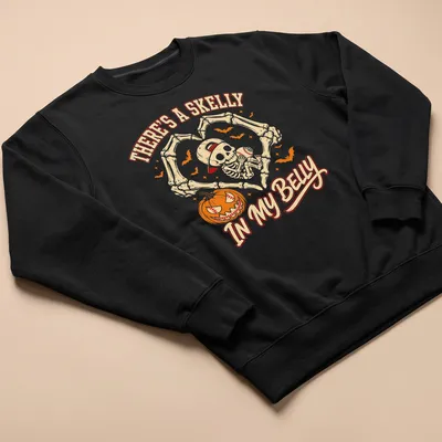 Cartoon skeleton with baseball and text about a skelly in a belly. — printed on a unisex sweatshirt