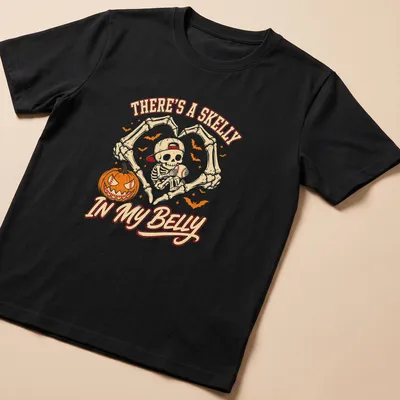 Cartoon skeleton with baseball and text about a skelly in a belly.