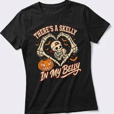 Cartoon skeleton with baseball and text about a skelly in a belly. — printed on a women's shirt